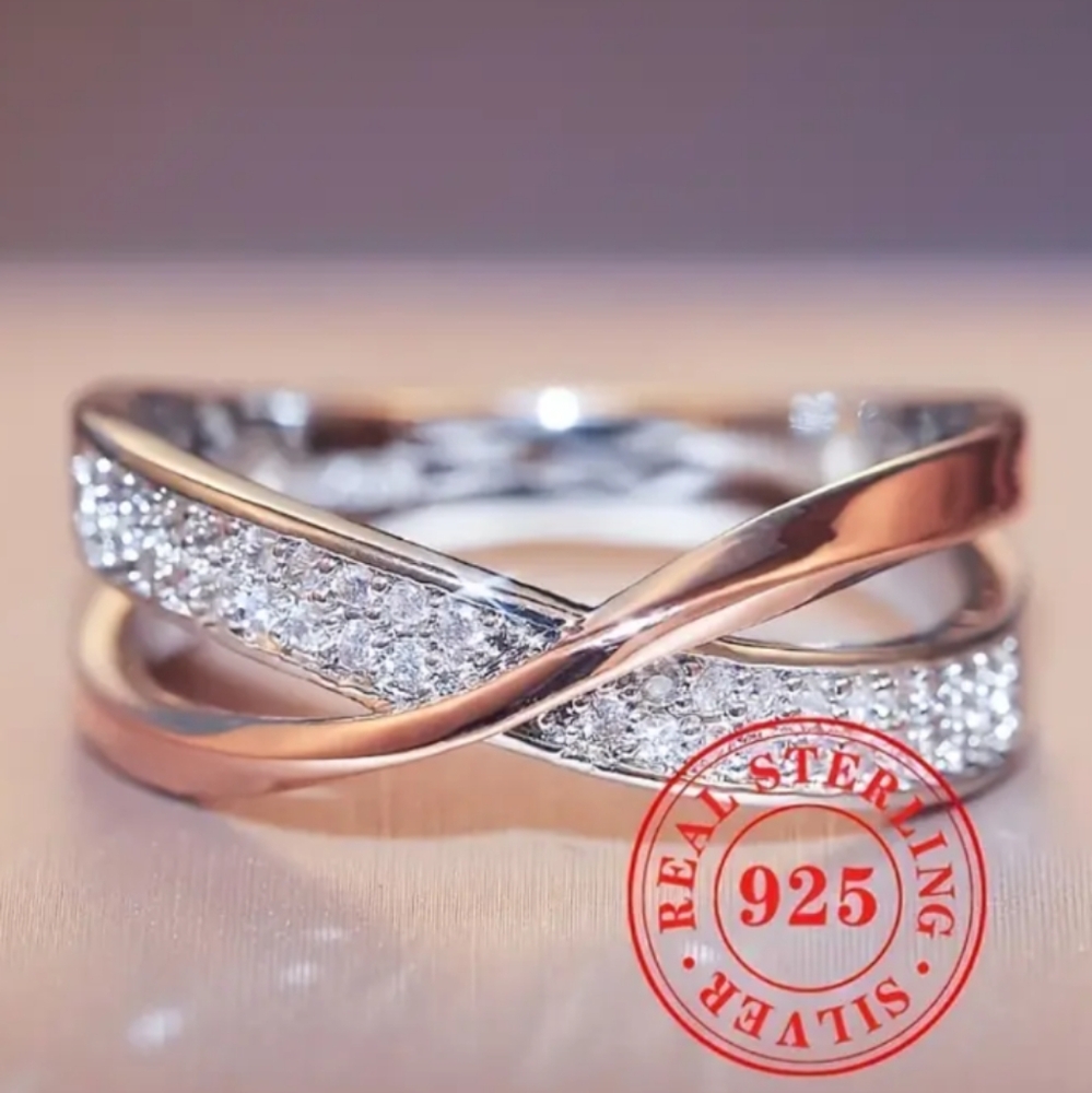 Elegant Sterling Silver and Rose Gold Mobius Designed Ring